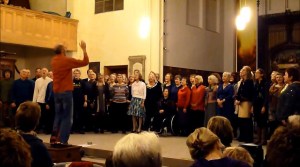 Bruce Knight conducting Songlines Community Choir in a performance of Nkosi Sikelelik 'lAfrika in St Mary's Church Leamington Spa on Saturday  7 December 2013