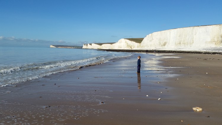 child on beach at Birling Gap 16 Feb 2016