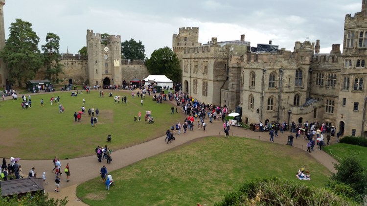 view of the castle courtyard from one of the state rooms at Warwick Castle