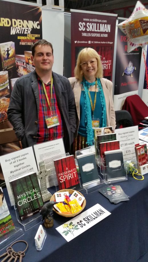 SC Skillman and assistant Jamie Robinson on the Author Stand at the UK Games Expo 2019