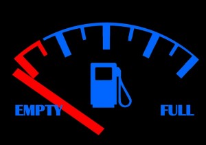 petrol gauge in car showing tank is empty